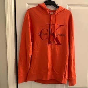 Calvin Klein men’s medium orange hoodie.